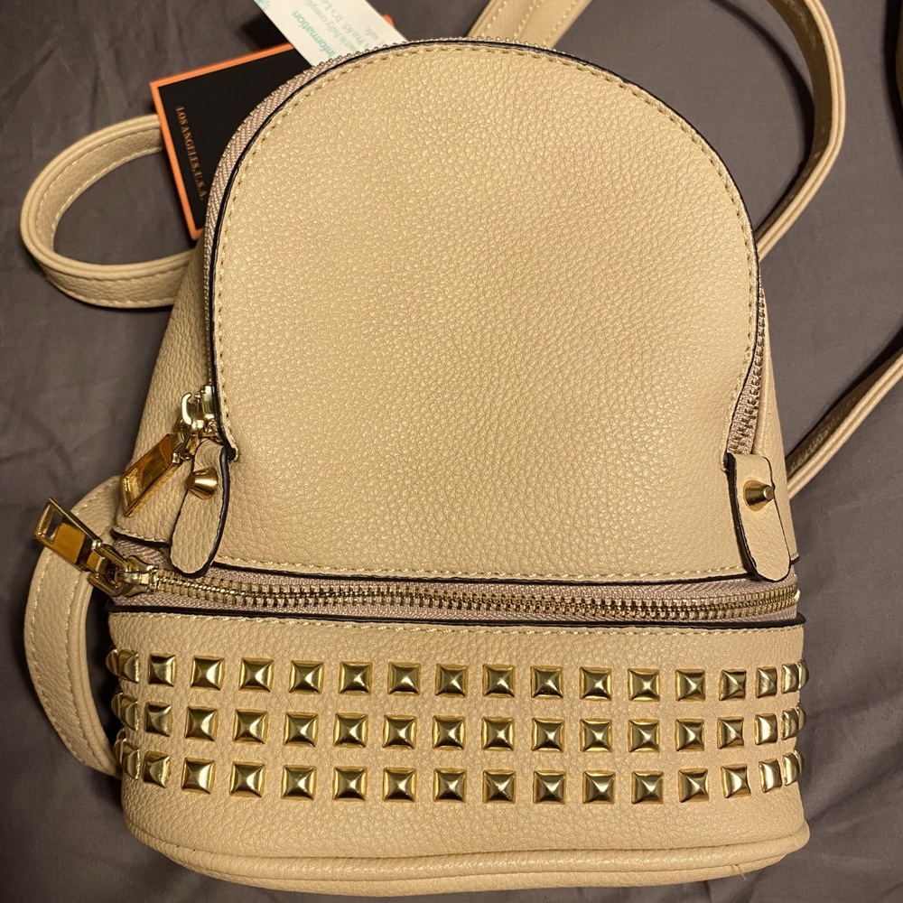 Small tan bag , faux leather , stylish backpack